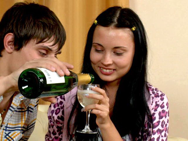 Kinky brunette teen babe Juliett drinking champagne with her young boyfriend