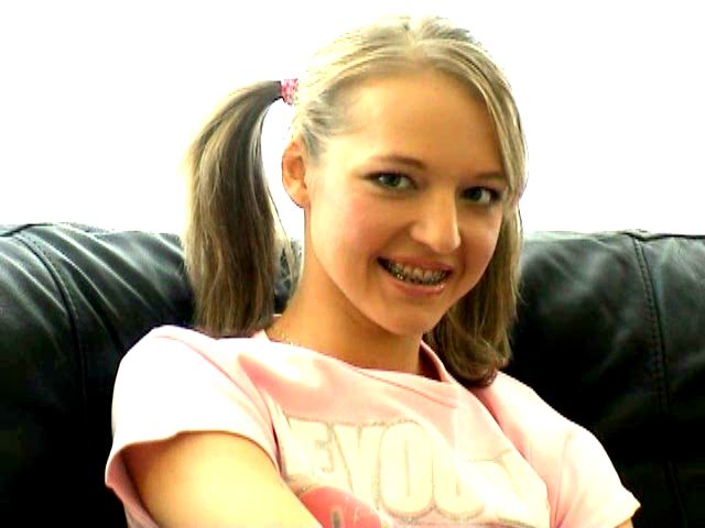 Sensual amateur British teen Britney showing tits and teasing with her little thong