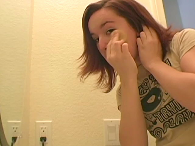 Lovable redhead teen Annabella getting ready for you in the mirror